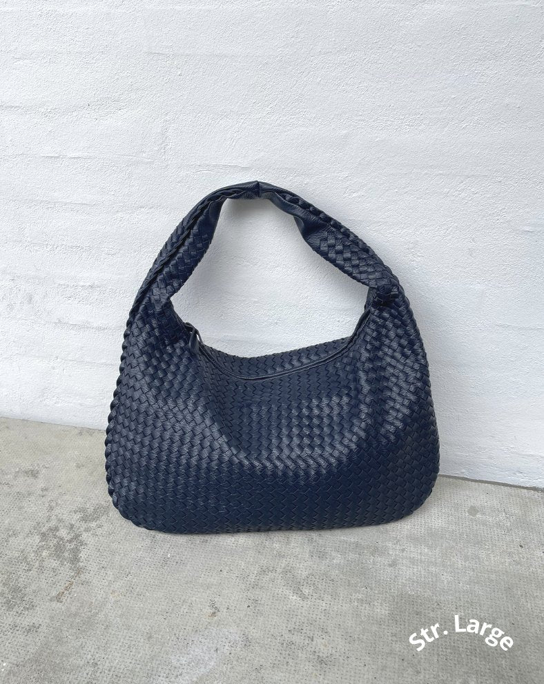 The Noel Bag™ - Braided Elegance with Smart Storage