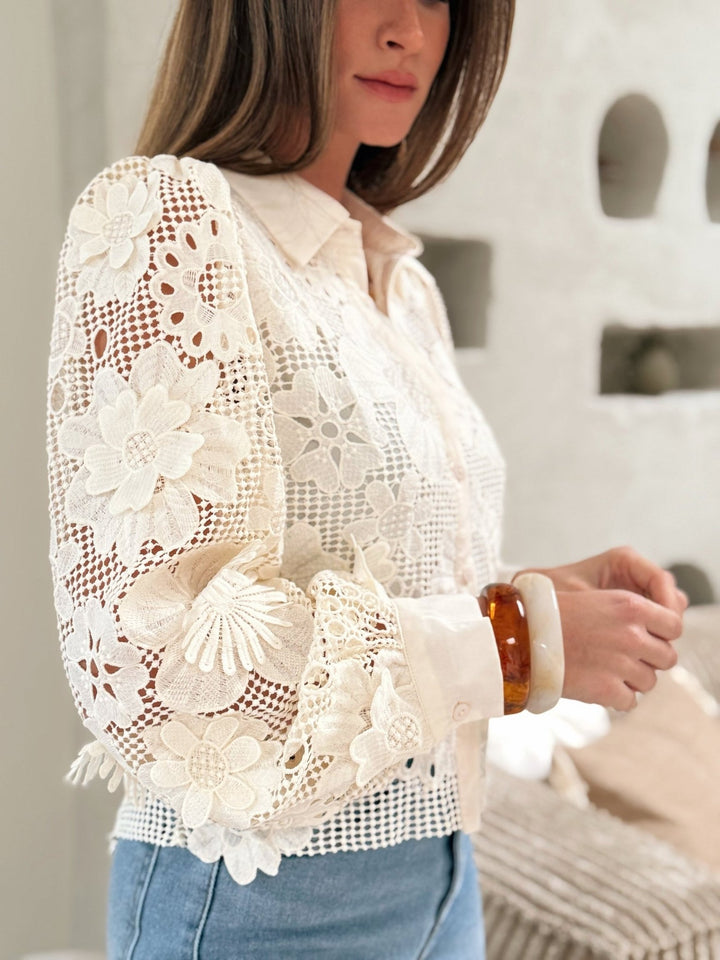 The beige Ivanka shirt