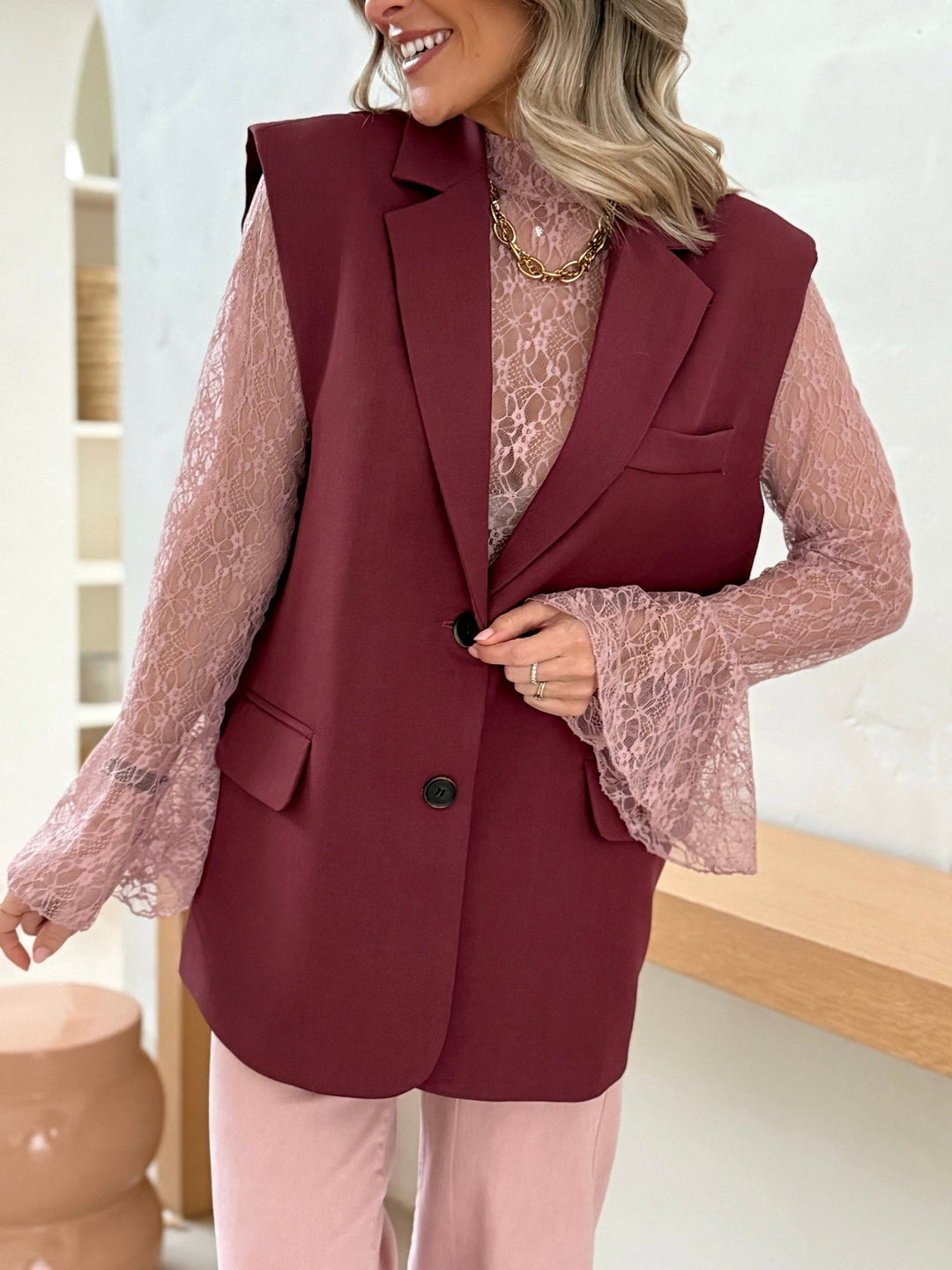 The Oria burgundy sleeveless jacket